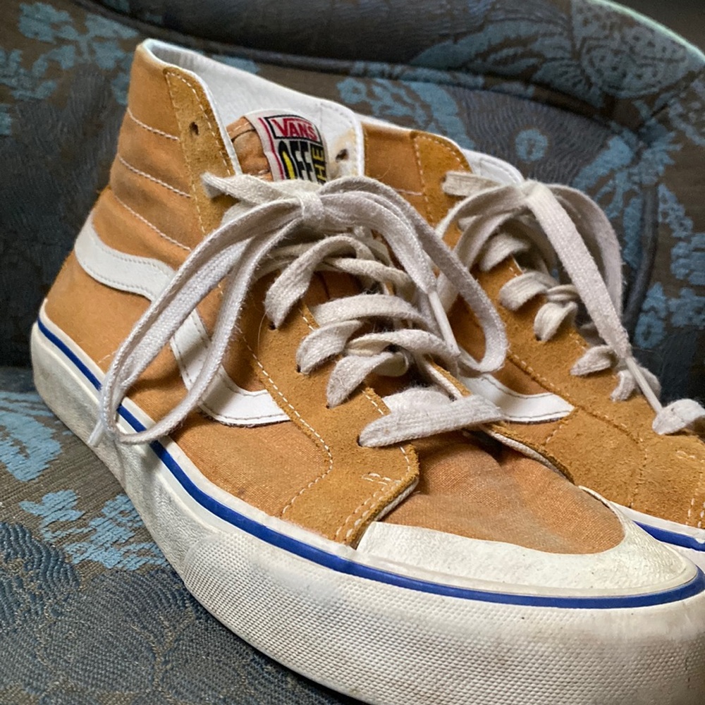 Yellow high top Vans